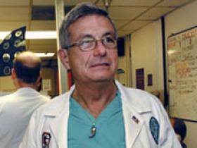 Dr. Norman E. Mc Swain