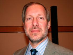 Dr. Christian Karmelic Serrano